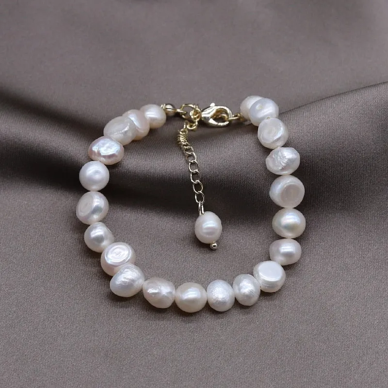 Elegant Freshwater Pearl Charm Bracelet with Copper Details