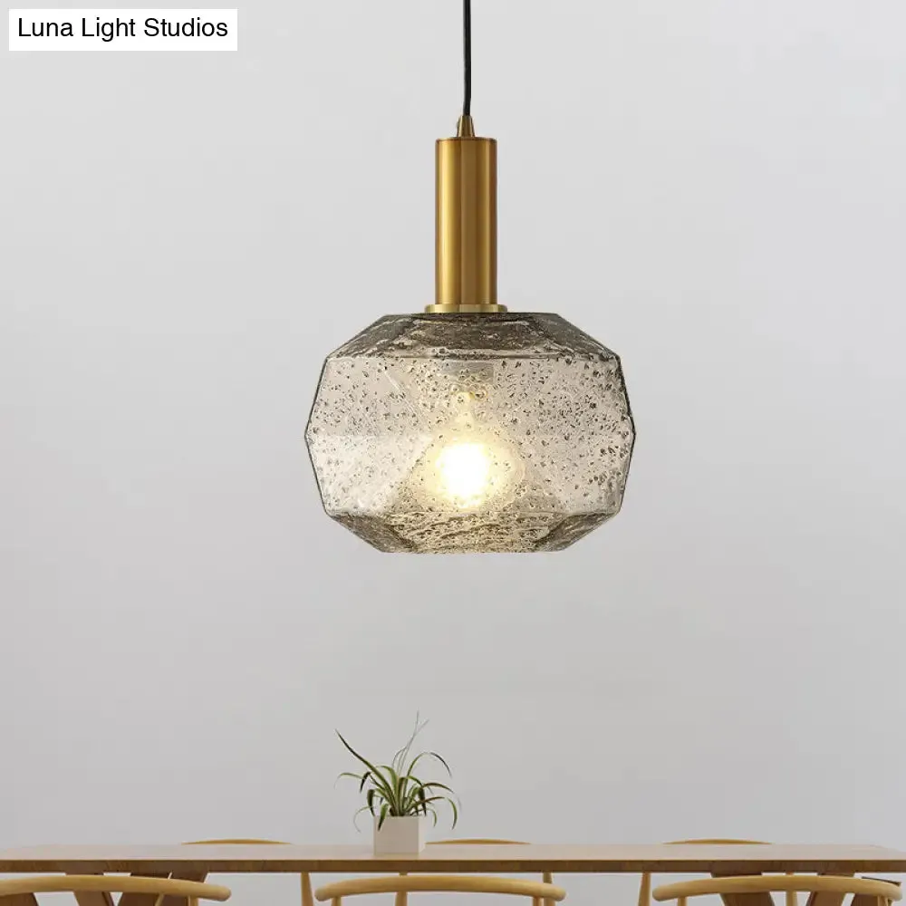 Modern Bedside Pendant Light with Smoky Gray Glass Shade and Brass Base