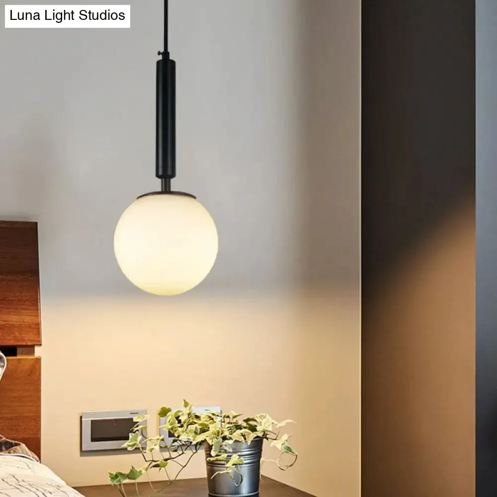 Sleek Bedside Pendant Lamp with White Glass Shade - Single Bulb Design