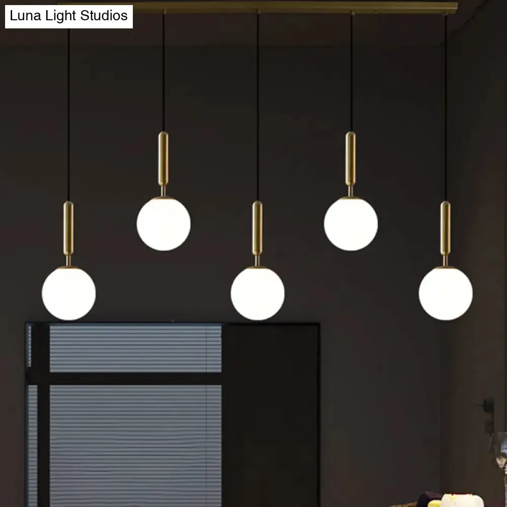 Sleek Brass Ball Pendant Light for Open Kitchen - Simplicity Glass Ceiling Fixture