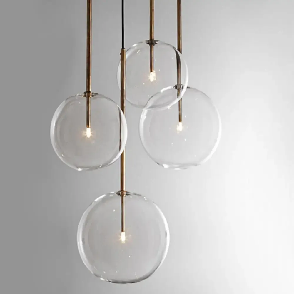 Sleek Gold Pendant Over Table: Clear Glass Globe Suspension Lighting (6"/8"/10" Wide)