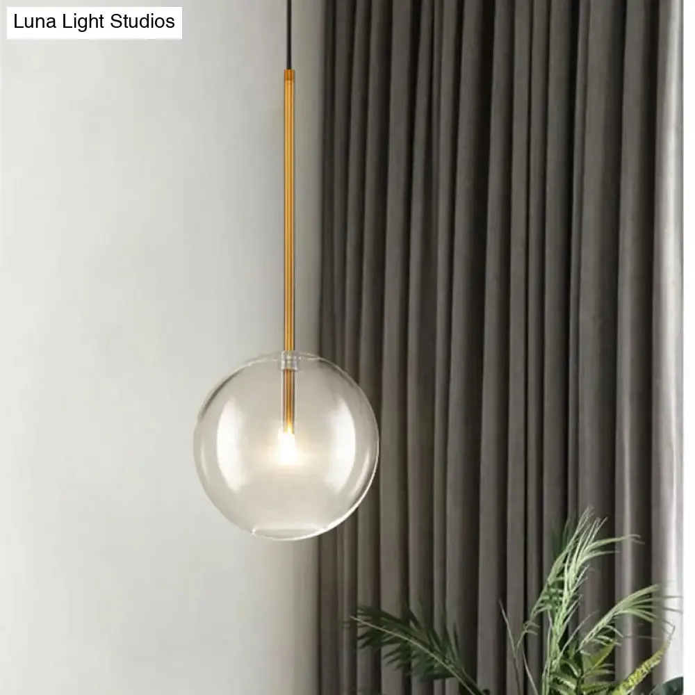 Sleek Gold Pendant Over Table: Clear Glass Globe Suspension Lighting (6"/8"/10" Wide)