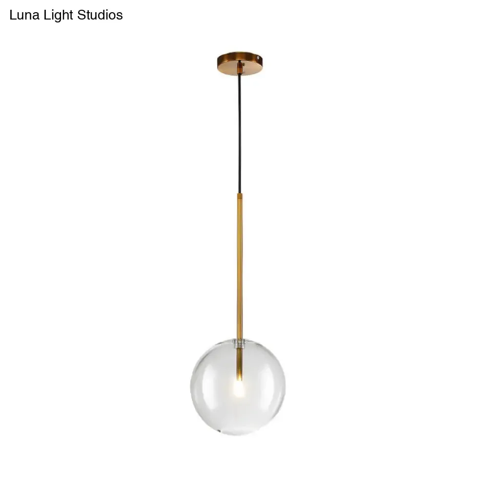 Sleek Gold Pendant Over Table: Clear Glass Globe Suspension Lighting (6"/8"/10" Wide)