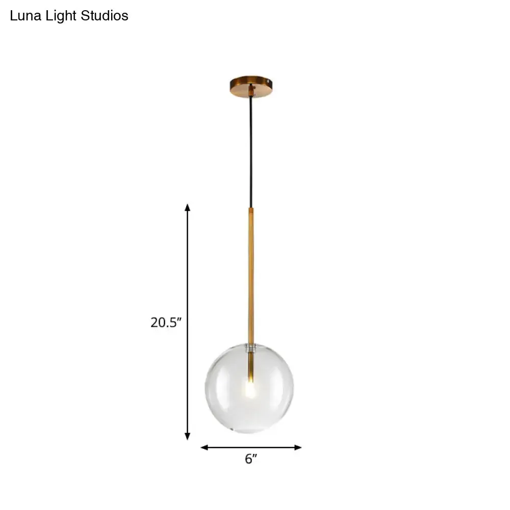 Sleek Gold Pendant Over Table: Clear Glass Globe Suspension Lighting (6"/8"/10" Wide)