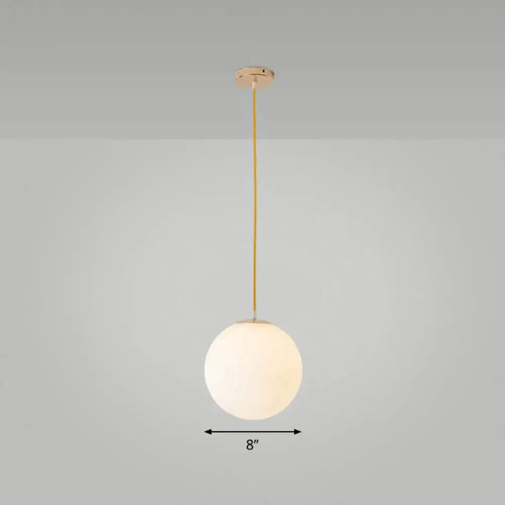 Sleek White Glass Pendant Light for Minimalist Table Settings