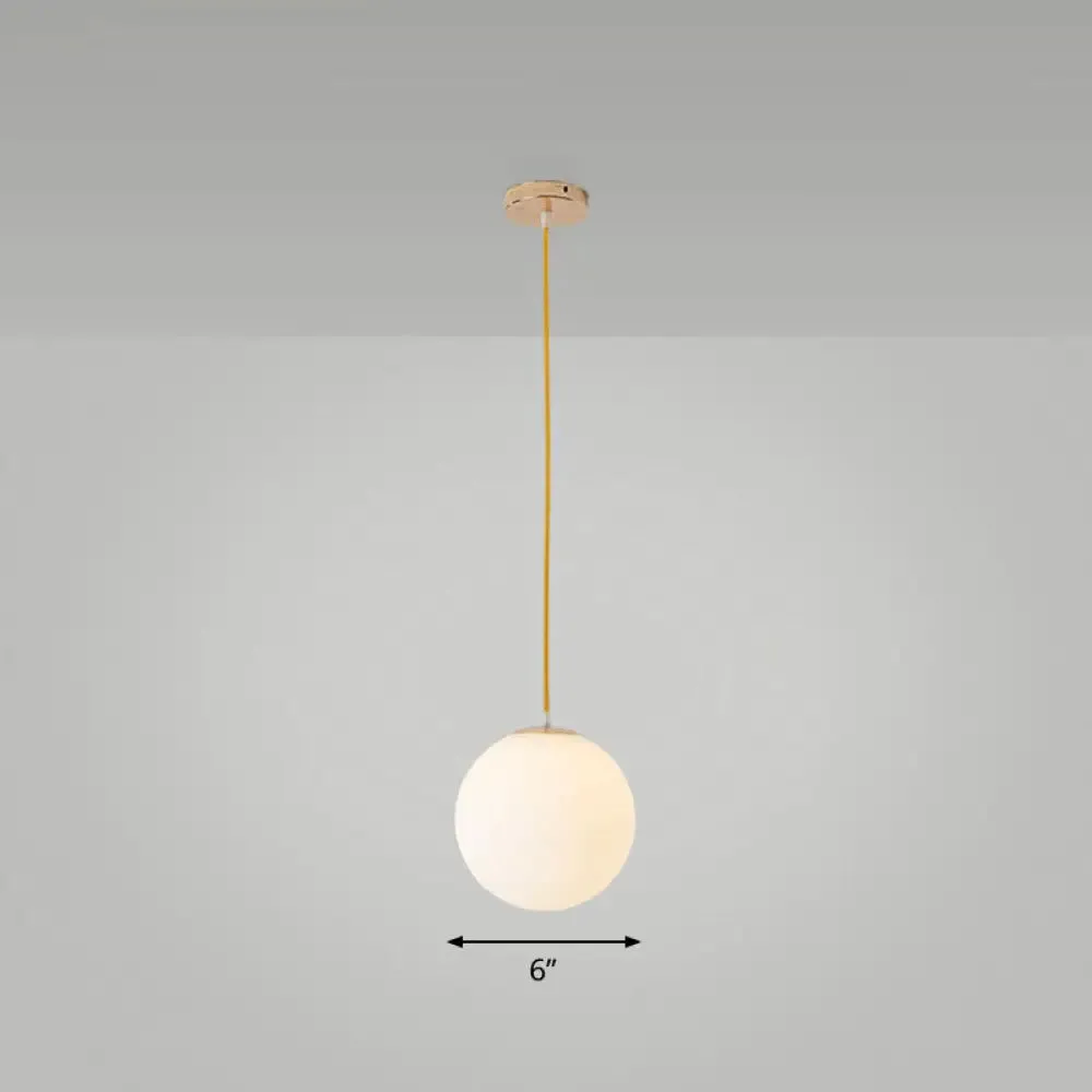 Sleek White Glass Pendant Light for Minimalist Table Settings